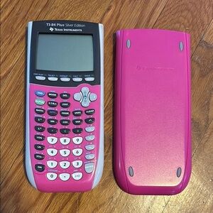 Pink TI84 graphing calculator